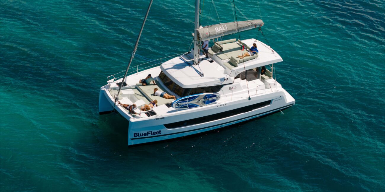 Private catamaran sailing off Lagos